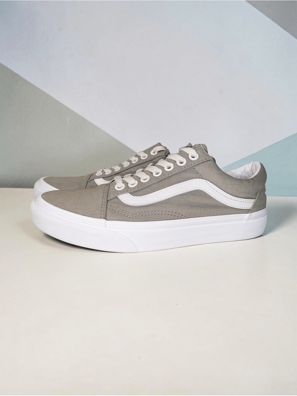 Vans EXO Low-Top Sneakers in Light Gray with White Stripe
